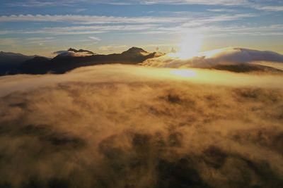 Scenic view of landscape against sky during sunset