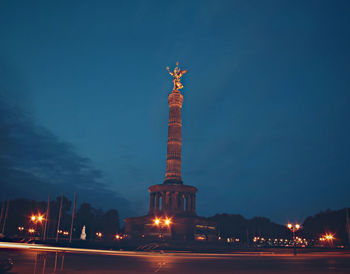 Low angle view of statue at night