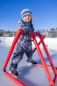 Portrait of smiling boy playing in playground