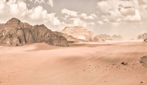 Scenic view of desert against sky