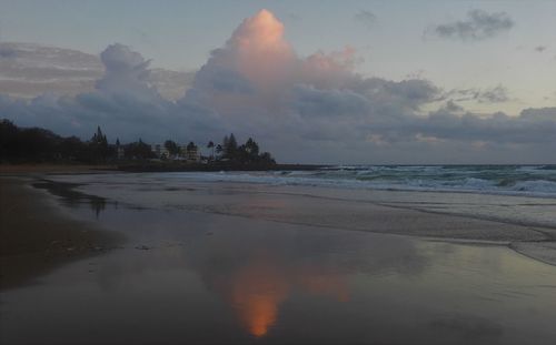 Scenic view of sea against sky at sunset