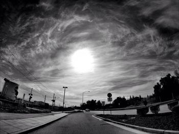 Road against cloudy sky