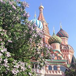 Low angle view of church against blue sky