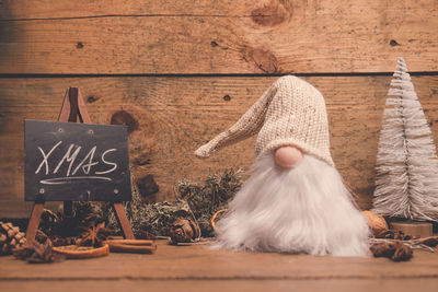 Man with text on wooden table