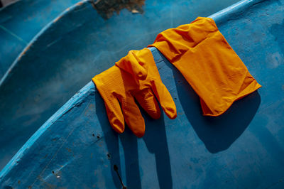 High angle view of clothes drying on blue water