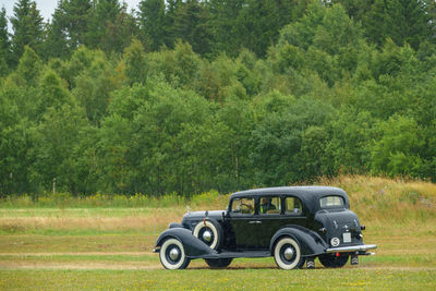 Vintage car on field
