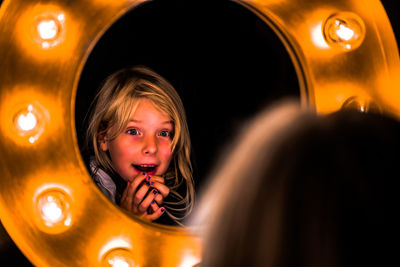 Close-up of illuminated boy