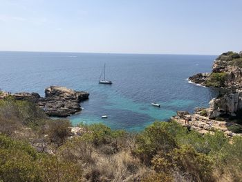 Scenic view of sea against clear sky