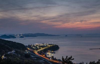 High angle view of city at sunset