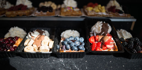 High angle view of fresh food in containers for sale at store