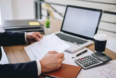 Man using laptop on table