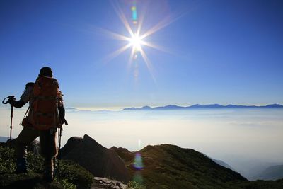 Sun shining over mountains