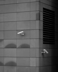 Reflection of building on wall