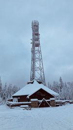 Communication tower in the middle of snow 