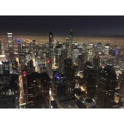 Aerial view of city against sky