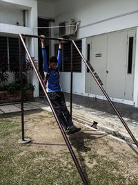 Man on metal structure