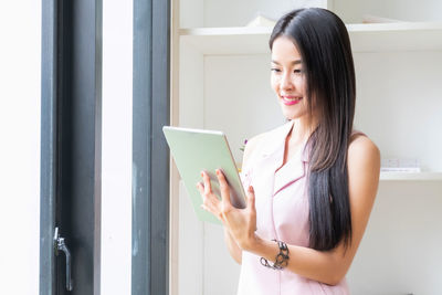 Young woman using mobile phone