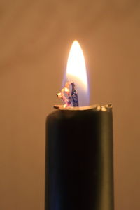 Close-up of burning candle