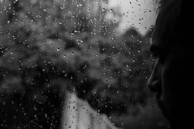 Close-up of wet window in rainy season