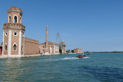 Boat leaving arsenale area in venice