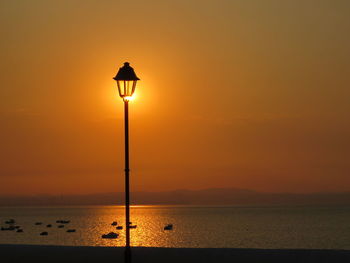 Scenic view of sea at sunset