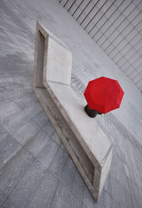 High angle view of red box on tiled floor