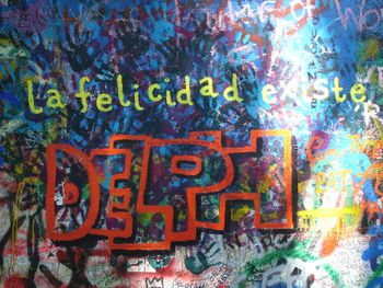 Close-up of multi colored text on wall