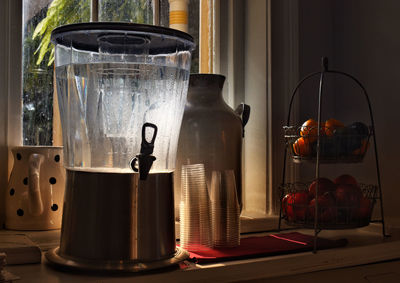 Close-up of glass jar on table at home