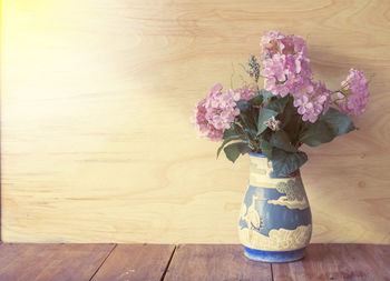 Close-up of flowers in vase on table