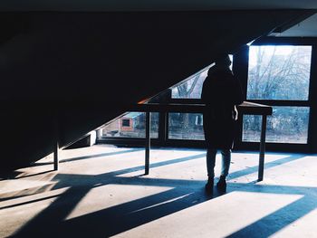 Shadow of woman on wall