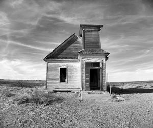 House on field against sky