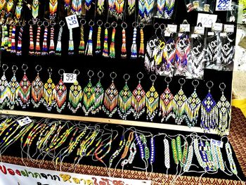 Full frame shot of multi colored decorations hanging at shop