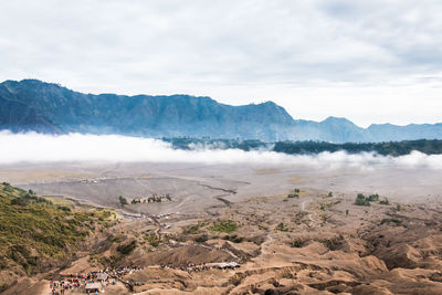 Scenic view of landscape and mountains against sky