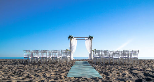 Chairs for wedding ceremony on beach