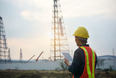 Man working on mobile phone