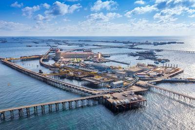 High angle view of boats moored at harbor
