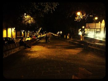 Illuminated street light at night