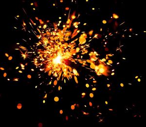 Firework display at night