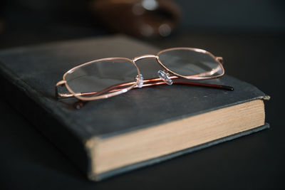 Close-up of sunglasses on table