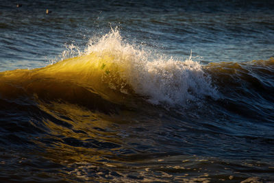 Close-up of waves splashing in sea