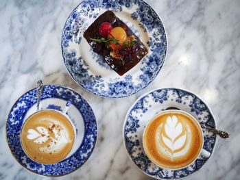 High angle view of coffee served on table