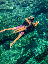 High angle view of person swimming in sea