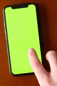 Close-up of person holding camera
