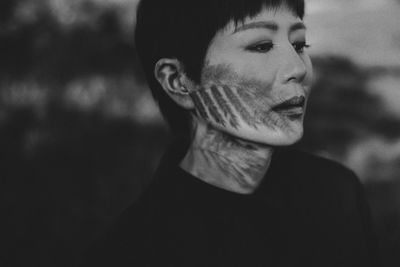 Portrait of young man looking away