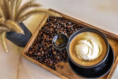 High angle view of coffee cup on table