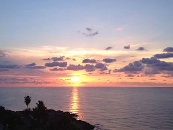 Scenic view of sea at sunset