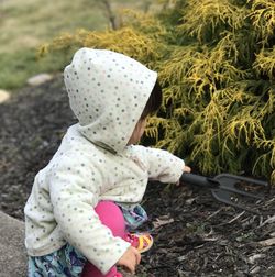 High angle view of girl gardening