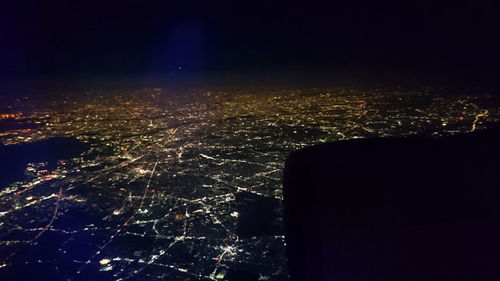 Aerial view of illuminated cityscape