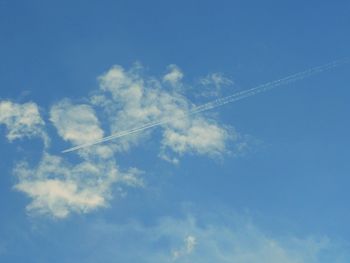 Low angle view of vapor trail in sky