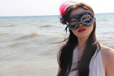 Portrait of young woman on beach